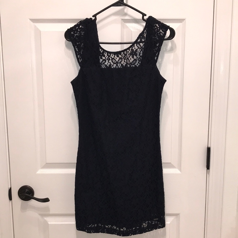 Form fitting, low back, lace dress. Fits beautifully! Worn once